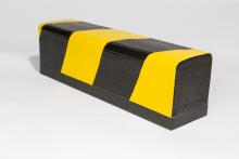 Ein schwarz-gelb gestrifter glänzender Kontaktpuffer